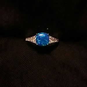 Blue Fire Opal And White Topaz On Irodium